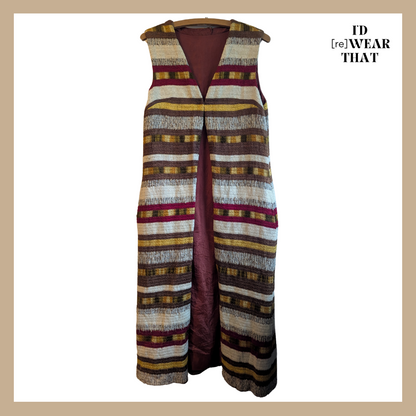 Front view of vintage 1970s sleeveless duster waistcoat