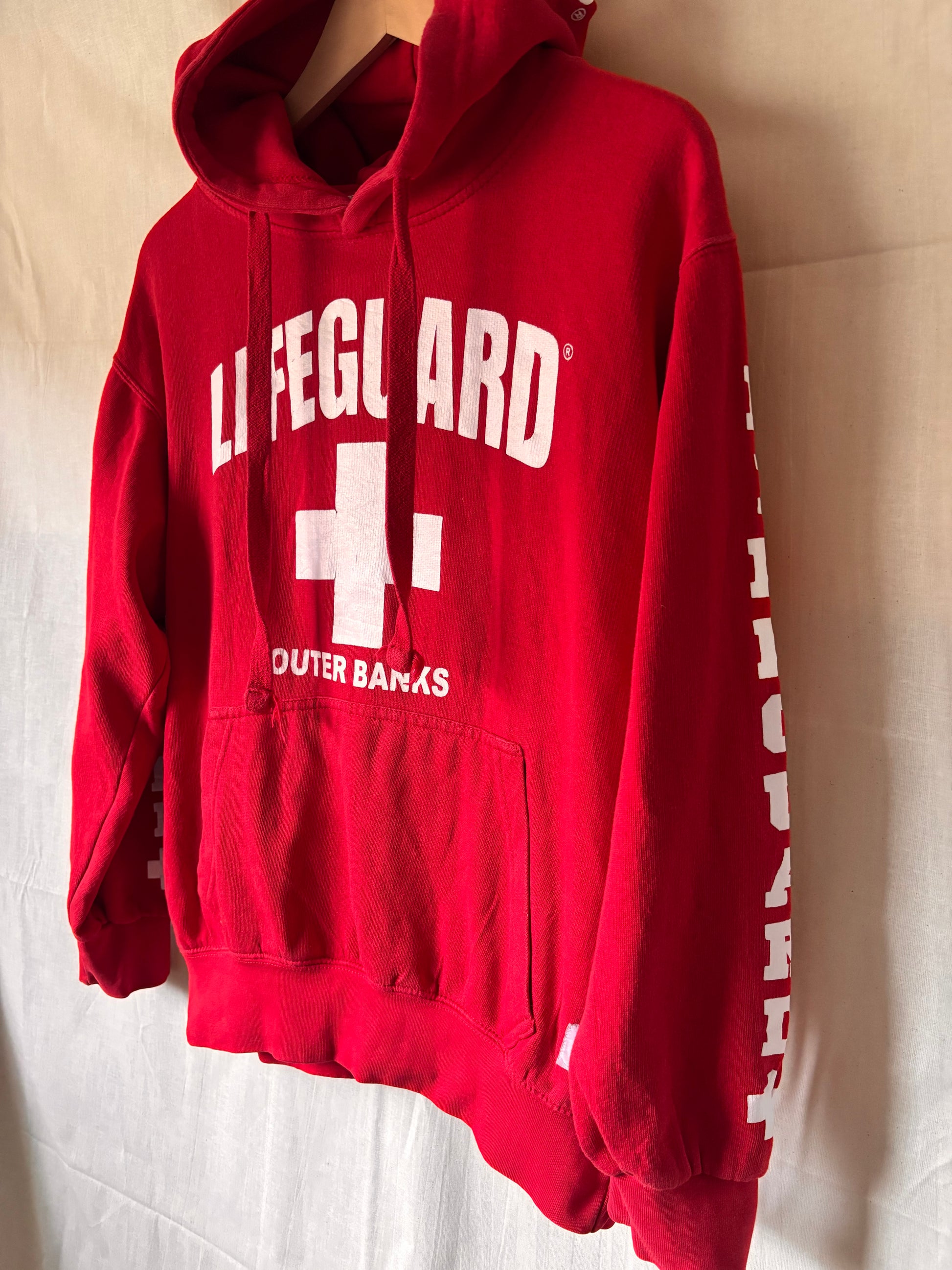Red hoodie with 'Lifeguard' 