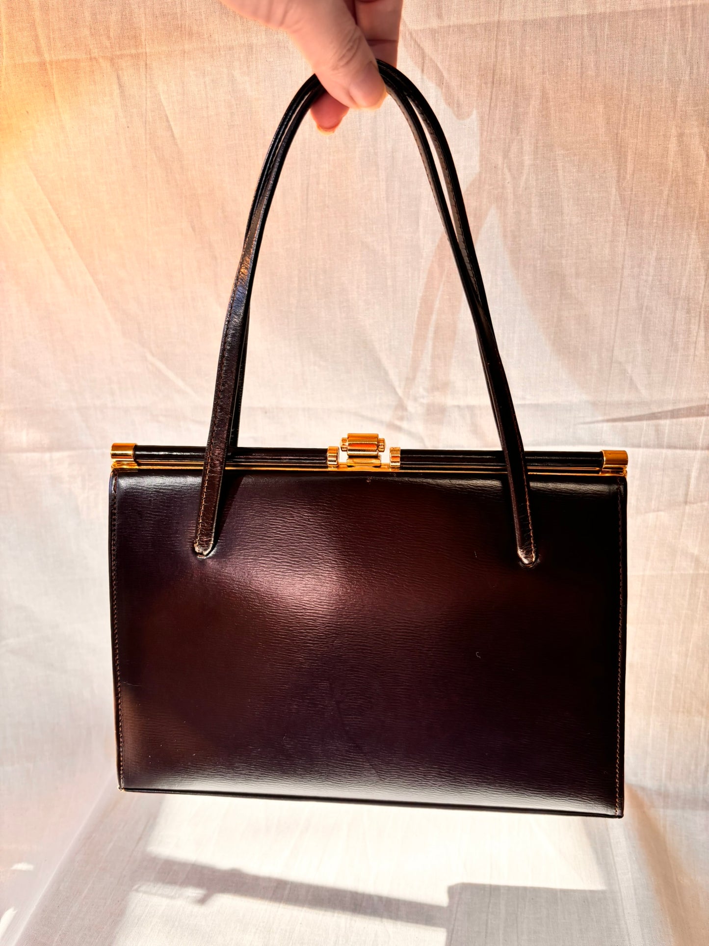 vintage 1960s structured chocolate leather handbag