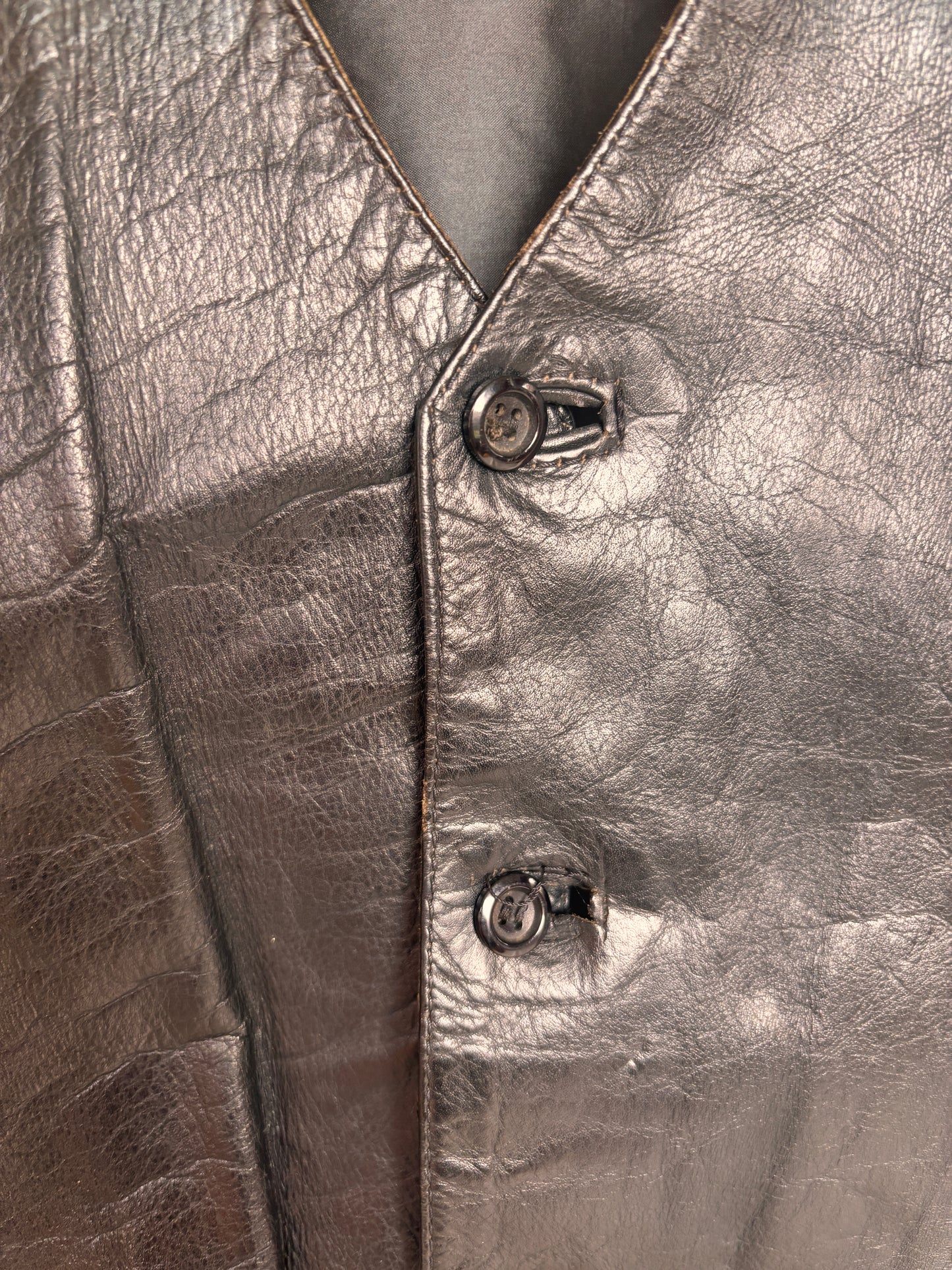close up of Vintage 1980s Black Leather Waistcoat Vest