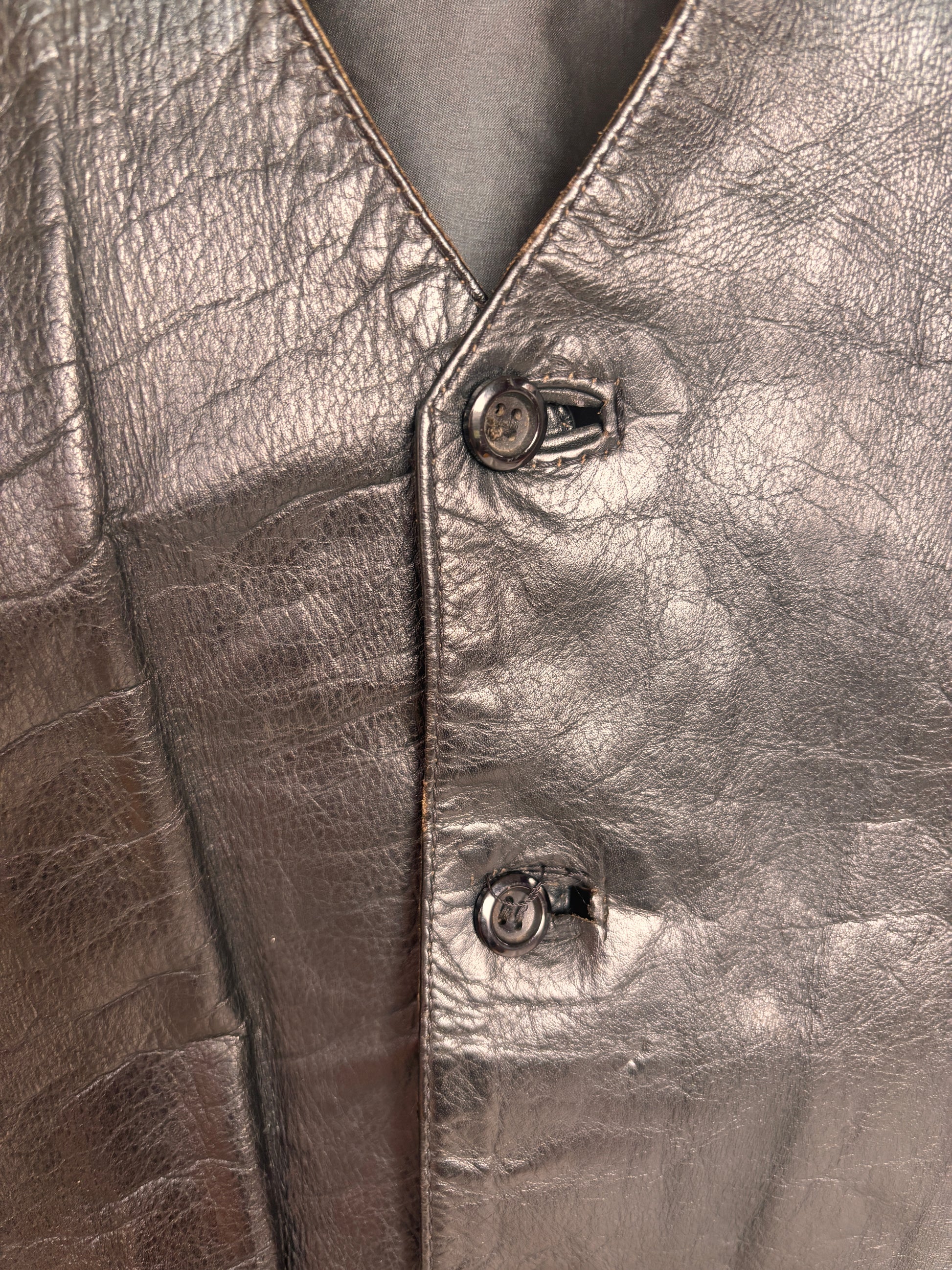 close up of Vintage 1980s Black Leather Waistcoat Vest