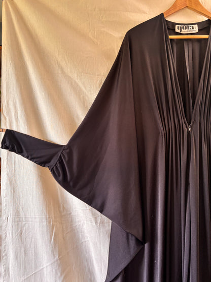 sleeve detail of Yuki for Rembrandt black zip-front kaftan with fitted cuffs