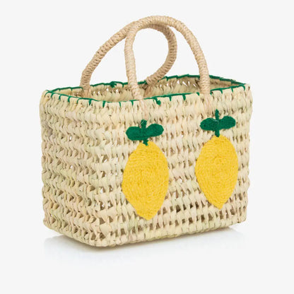 Woven bag with lemon decorations on a white background