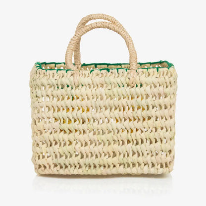 back view of straw bag with handles. No embroidery detail on this side.